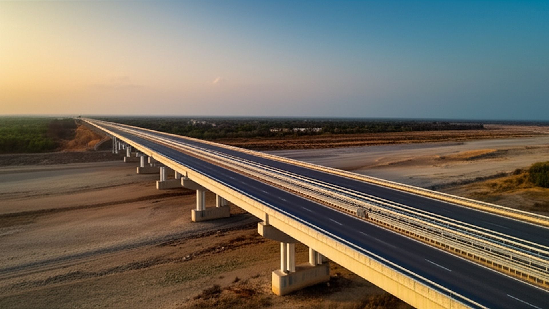 Architectural photograph of the NH-48 km 114+470–116+180 service road bridge in Gujarat. A modern, 3-lane concrete bridge gracefully spans a dry riverbed, blending with the arid landscape. Shot during golden hour; warm, soft light emphasizes texture and form. Professional architectural photography style, utilizing wide-angle lens for perspective and depth. Capture crisp details, showcasing both the bridge's scale and its integration with the natural environment. Include subtle shadows and realistic textures for visual impact.. Professional architectural photography, ultra-high quality, sharp focus, vivid colors, dramatic lighting, golden hour, cinematic composition, 8K UHD, photorealistic.